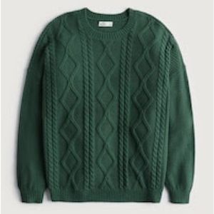 green argyle-like sweater